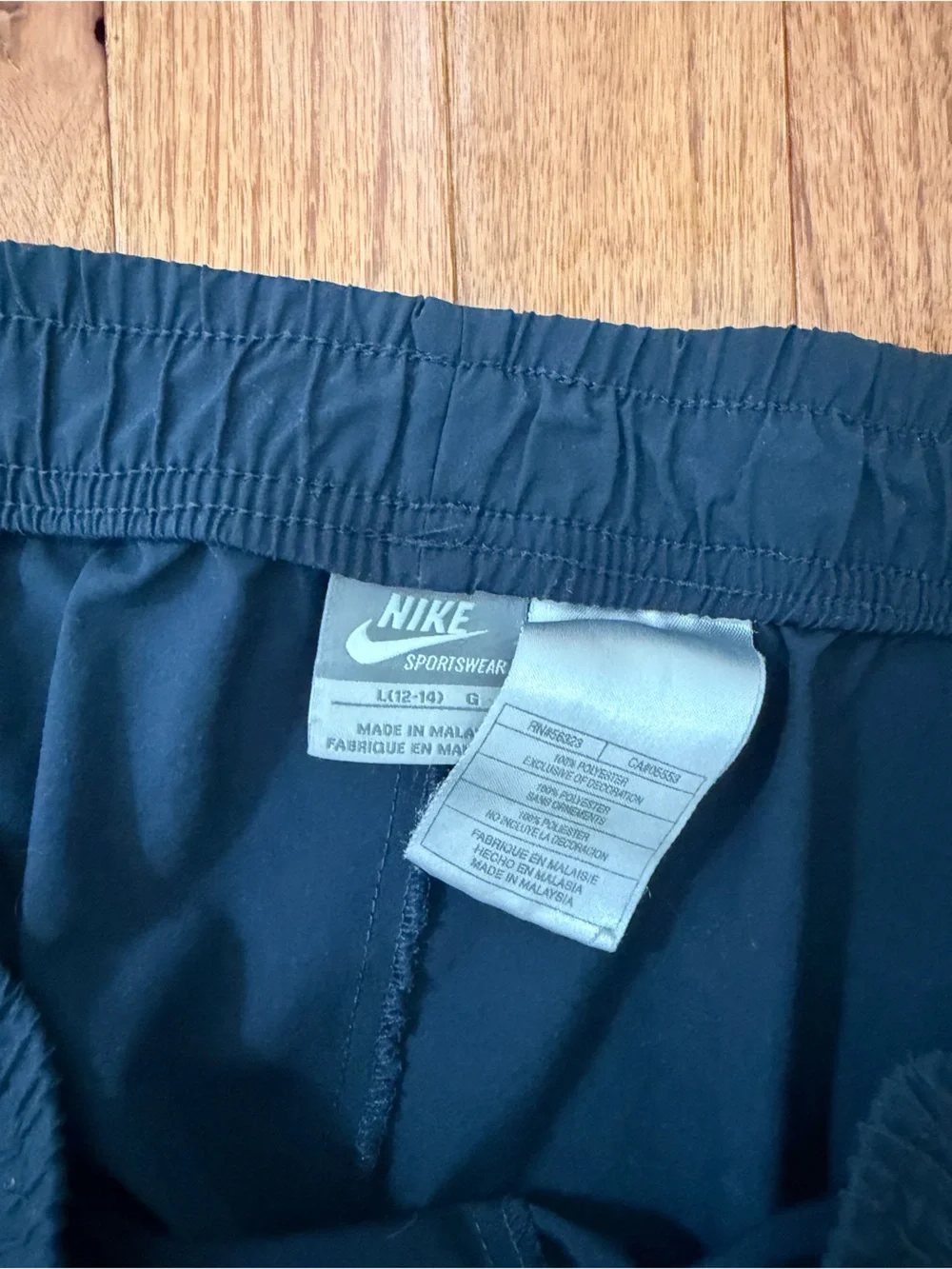 Nike Black Track Pants with Blue Side Stripes